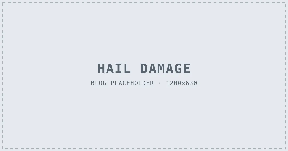 Close-up of hail impact marks on an asphalt shingle roof